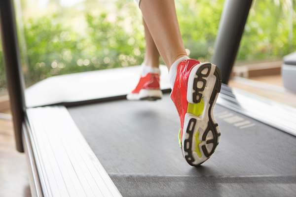 A person is running on a treadmill.